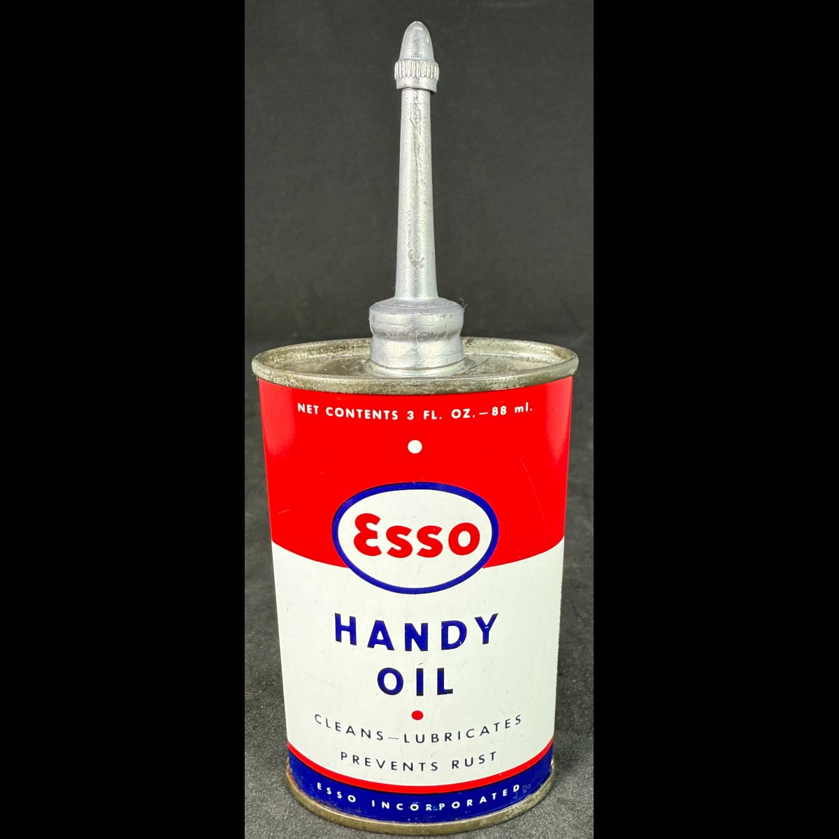 Household Oil Tin Oiler. Esso Handy Oil. 3 oz. Esso Incorporated. Made in USA.  (Not for standard post due to contents. Winning bidder will have to make other arrangements to collect)