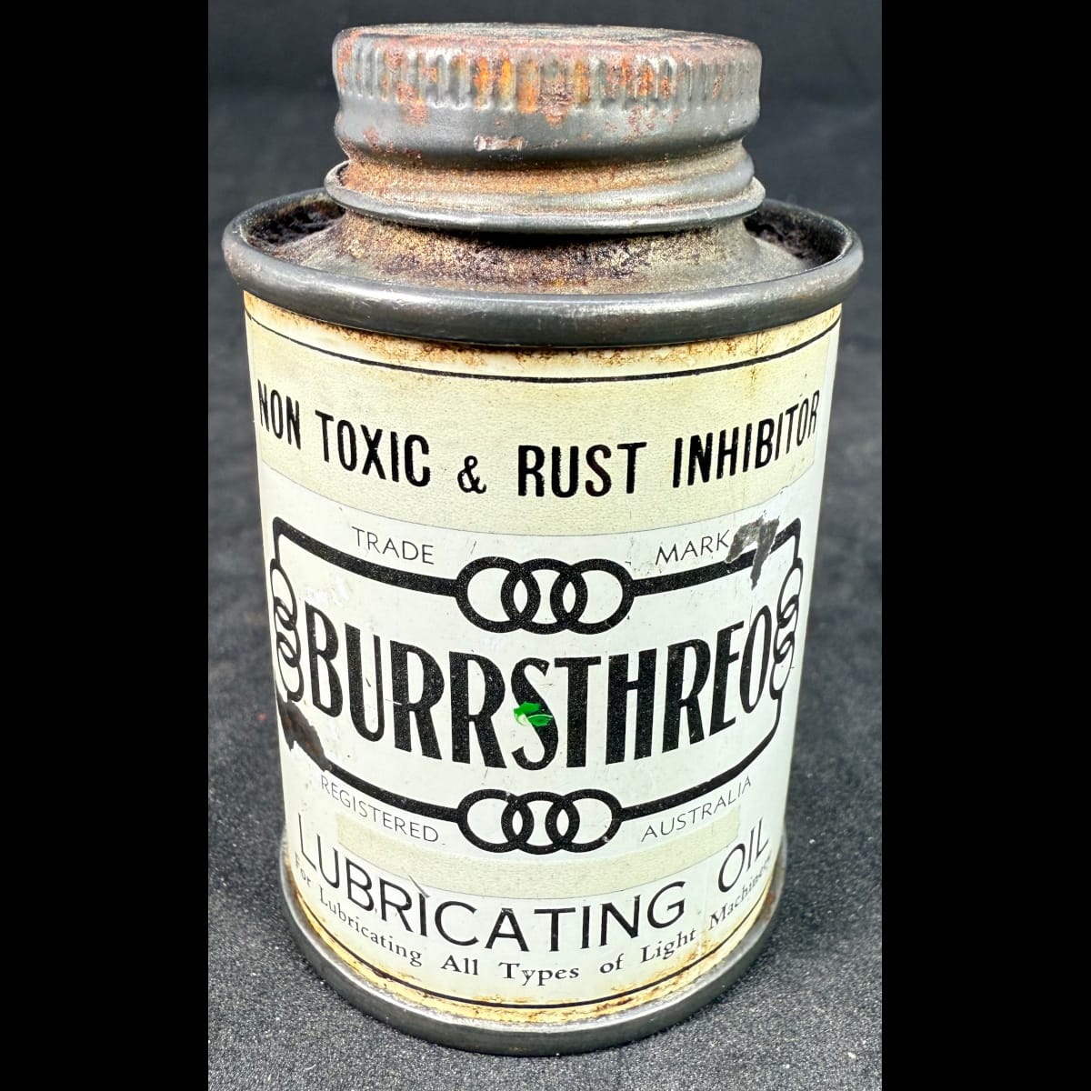 Small oil tin. Burrsthreo Lubricating Oil. 2 oz. C. R. Burr, Glenhuntly, Victoria. (Not for standard post due to contents. Winning bidder will have to make other arrangements to collect)