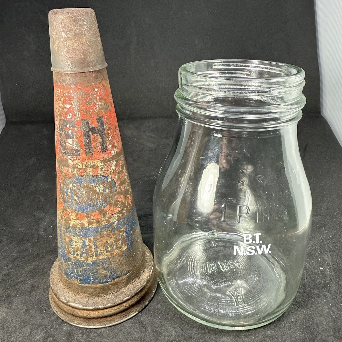 Tin oil top pourer and plain pint bottle. Sternol. EH. SAE 60. B. T. N. S. W ceramic label on bottle.