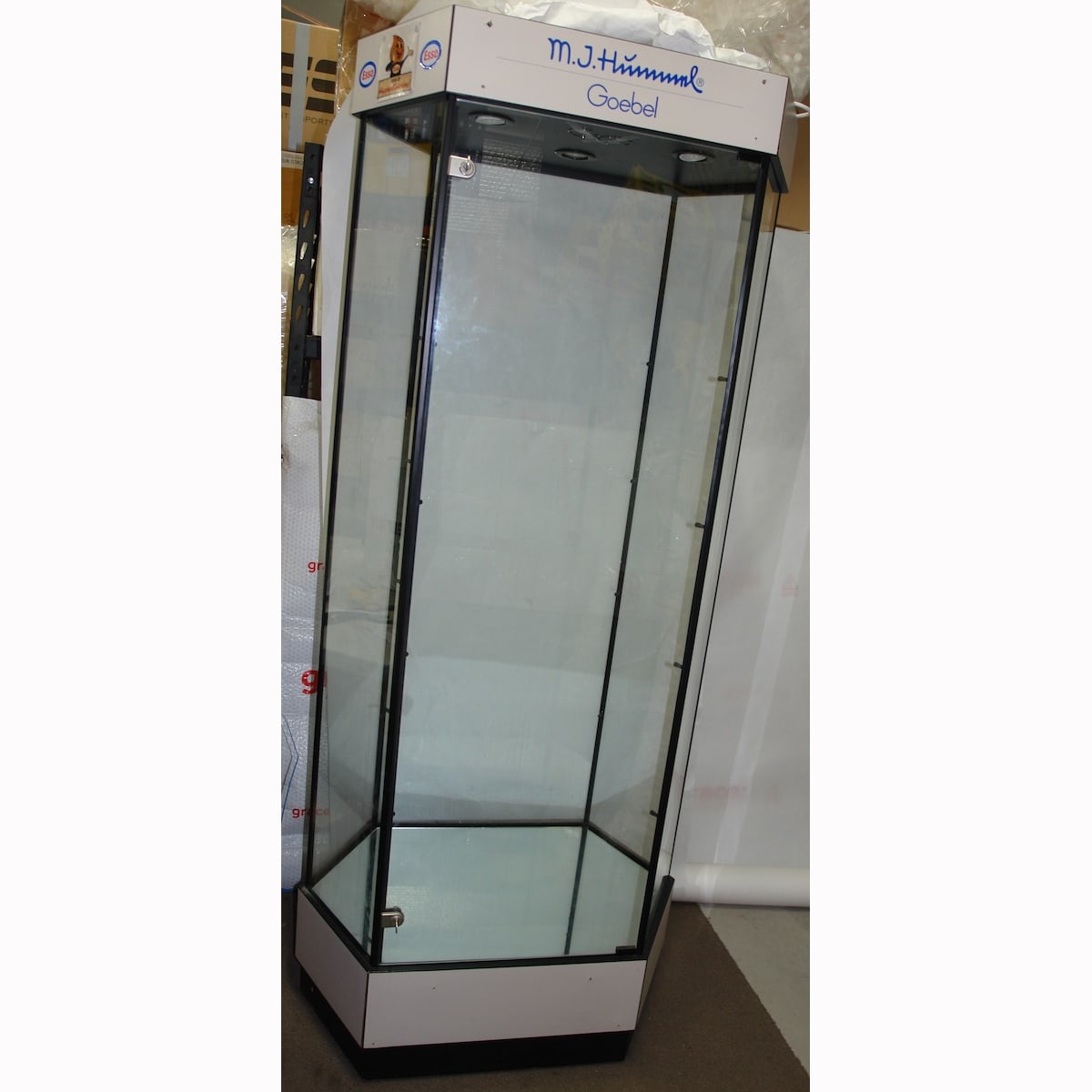 Large Hexagonal Cabinet on wheels. Branded Hummel. Not for standard post. Winning Bidder will have to make arrangements for pickup or courier delivery.