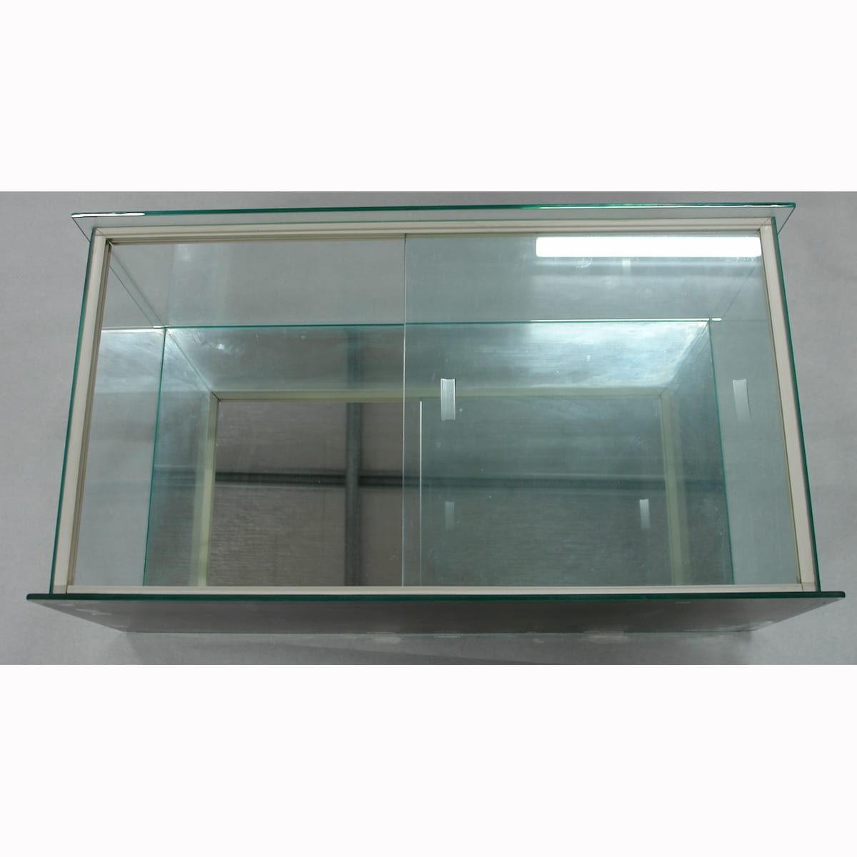 Smaller display cabinet. Not for standard post. Winning Bidder will have to make arrangements for pickup or courier delivery.