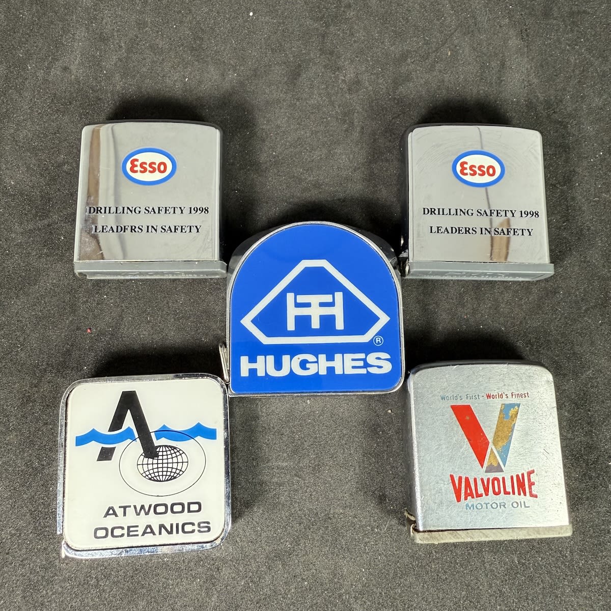 5 Advertising/Promotional Tape Measures: 2 x Esso Drilling Safety 1998; Valvoline; Atwood Oceanics; Hughes.