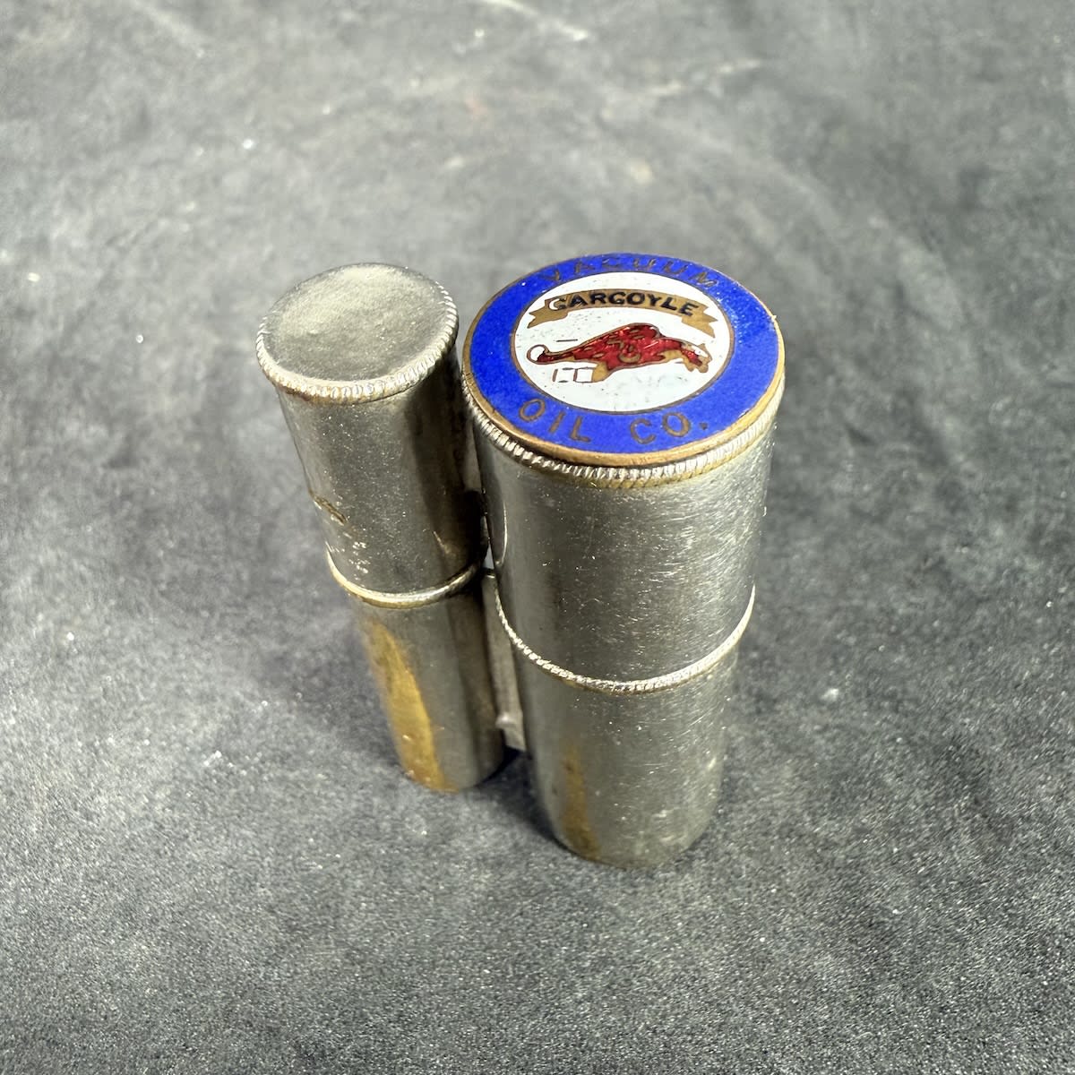 Self igniting lighter. With enamel badge for Vacuum Oil Co. Gargoyle.