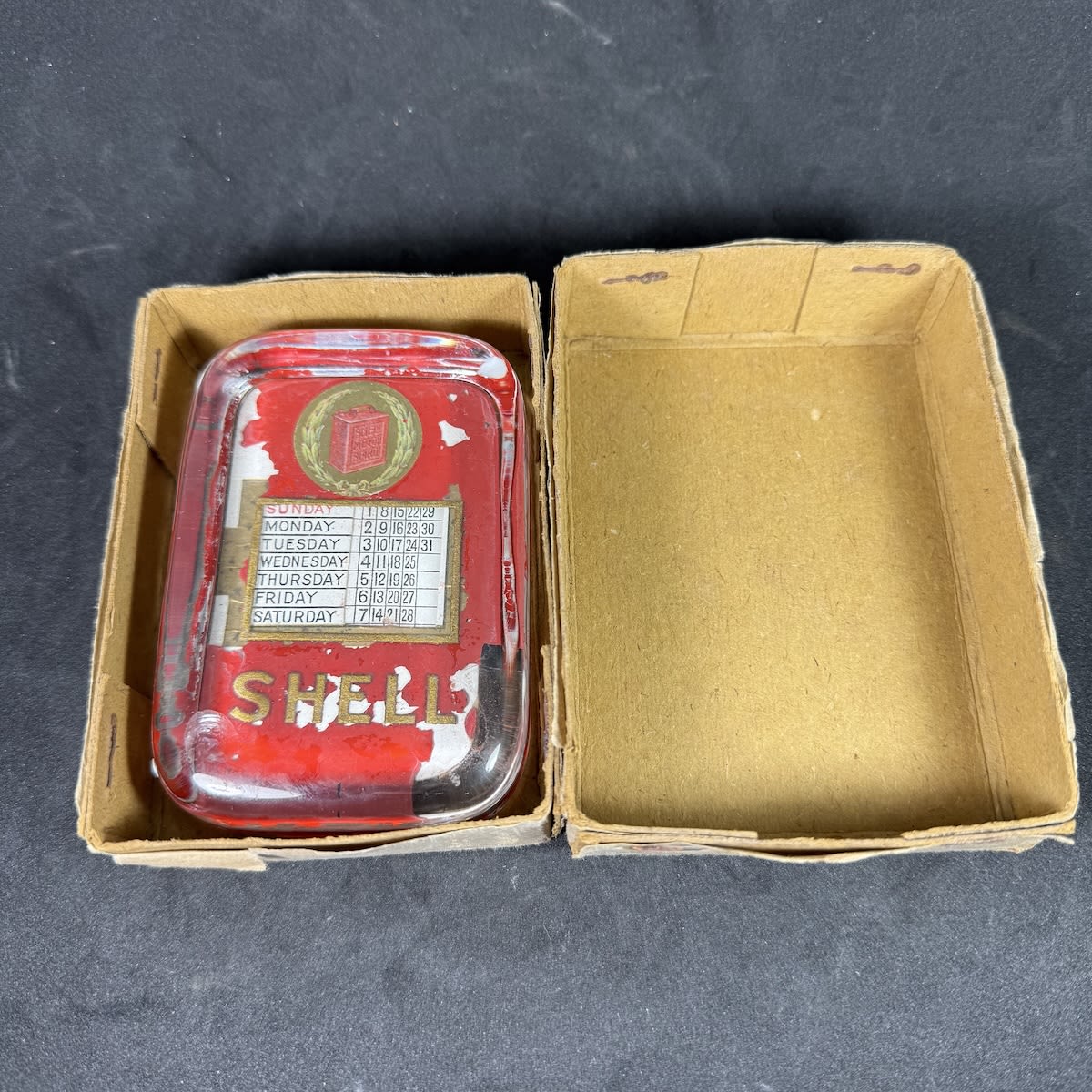 Advertising Paperweight. Shell Motor Spirit. Leather base with changeable calendar inside.