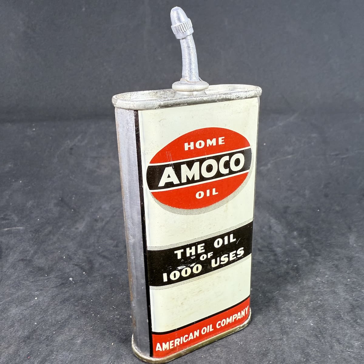 Household Oil Tin Oiler. Amoco Home Oil. American Oil Company. 3 oz.  (Not for standard post due to contents. Winning bidder will have to make other arrangements to collect)