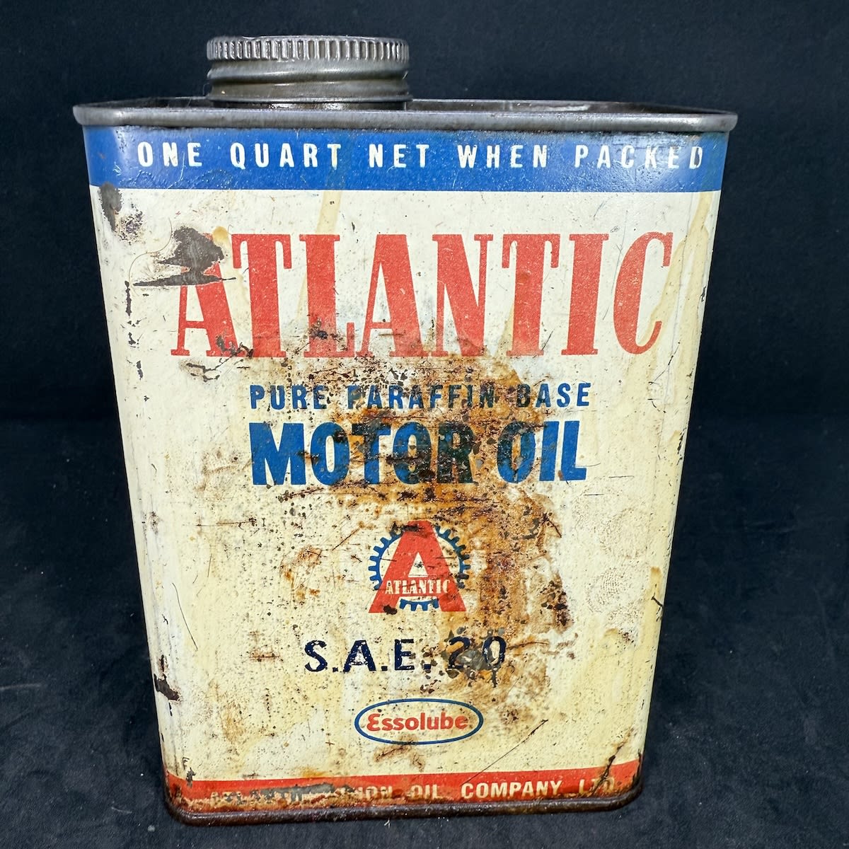 Oil Tin. Neptune Motor Oil. Pure Paraffin Base. Essolube. SAE 20. One Quart.