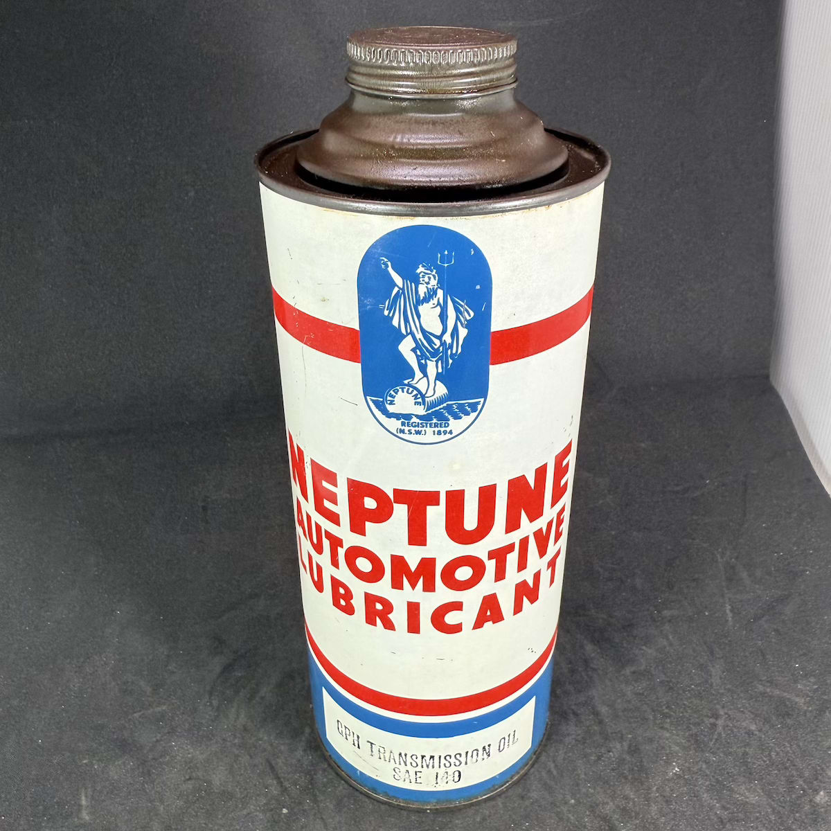 Oil Tin. Neptune Automotive Lubricant. Neptune Oil Company Pty Ltd. King Neptune on a barrel.