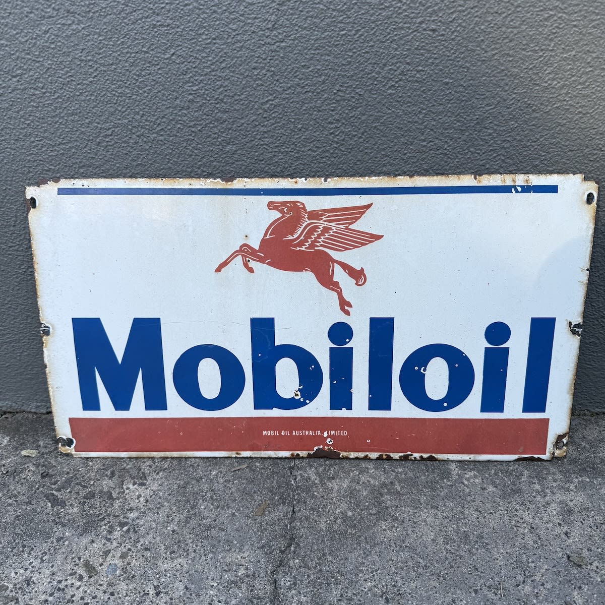 Enamel Sign. Mobiloil. Pegasus facing left. Mobil Oil Australia Limited. Oil Rack Sign.