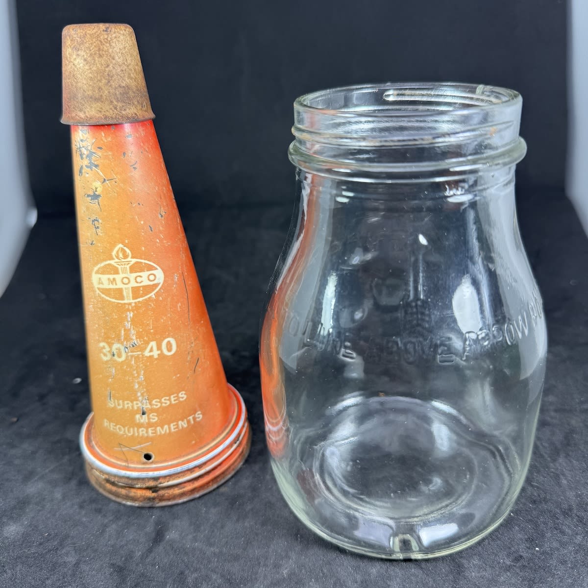Pint oil bottle with tin top pourer. Amoco 30-40 Surpasses MS Requirements. Generic Imperial Pint bottle.