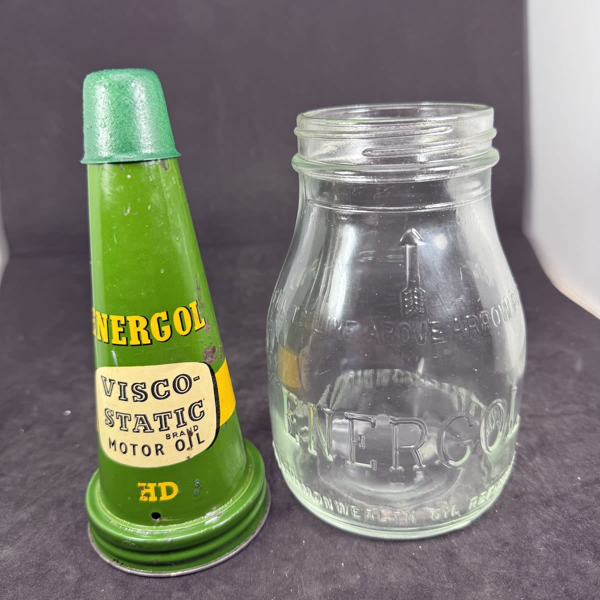 Pint Oil bottle with tin top pourer. Energol Visco-static Motor oil. Energol. Commonwealth Oil Refineries Ltd bottle.
