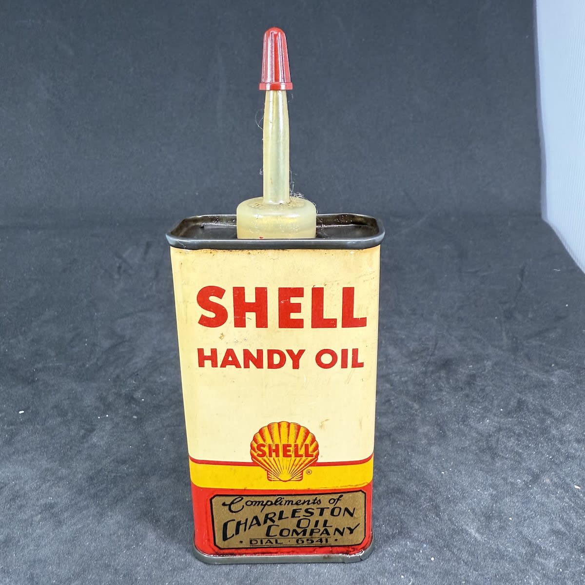Household Oiler. Oil Tin. Shell Handy Oil. Shell Oil Company. Compliments of Charleston Oil Company.