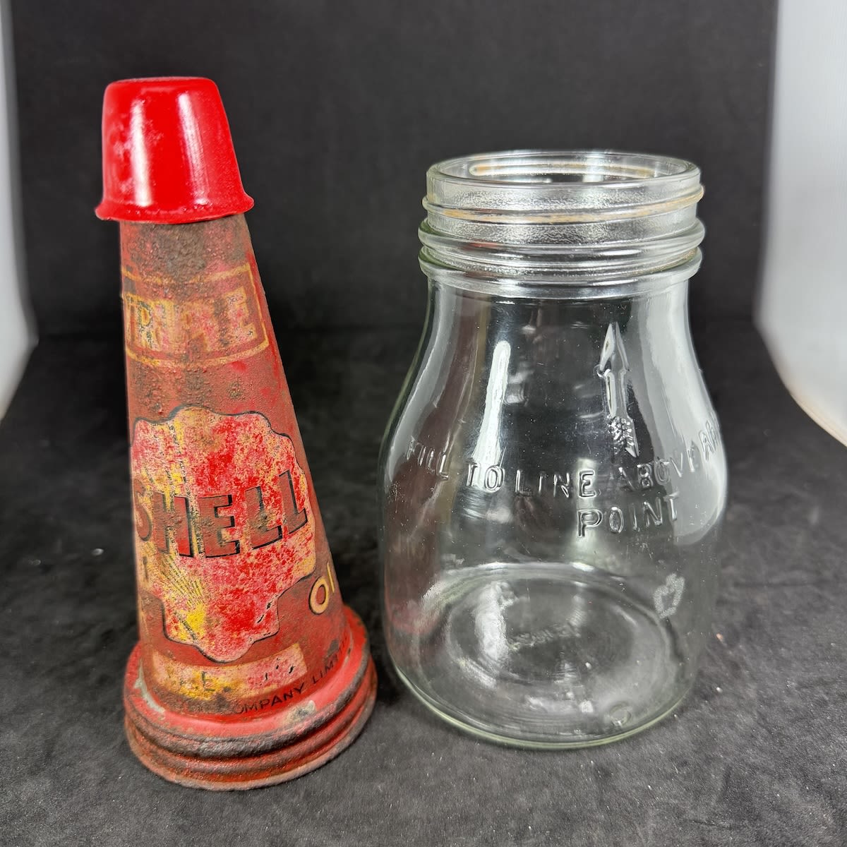 Pint Oil Bottle with Tin Top Pourer. Shell Triple Motor Oil. The Shell Company Limited. Generic Pint Bottle.