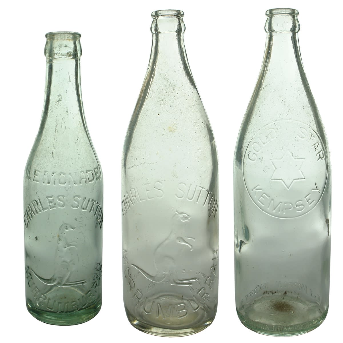 Crown Seals. 1. Charles Sutton, Murrumburrah. Clear. 10 oz. 2. Charles Sutton, Murrumburrah. Clear. 24 oz. 3. Gold Star, Kempsey. Aqua. 24 oz. (New South Wales)