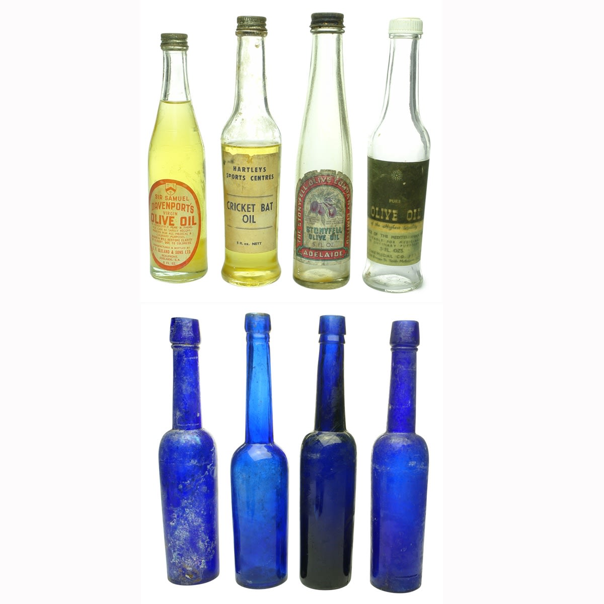Oils: 1. Sir Samuel Davenport's Virgin Olive Oil, G. F. Cleland & Sons Ltd., Beaumont, Adelaide, S. A. Clear. 5 oz. 2. Hartleys Sports Centres Cricket Bat Oil. Clear. 5 oz. 3. The Stonyfell Olive Company Limited, Adelaide. Olive Oil. Clear. 5 oz. 4. Chemical Co, South Melbourne, Pure Olive Oil. Clear. 5 oz. 5. Cobalt Castor Oil. W. E. C. base mark. 5 oz. 6. Cobalt Castor Oil. F. B. H. base mark. 5 oz. 7. Cobalt Castor Oil. No base mark. 5 oz. 8. Cobalt Castor Oil. W. E. C. base mark. 5 oz.