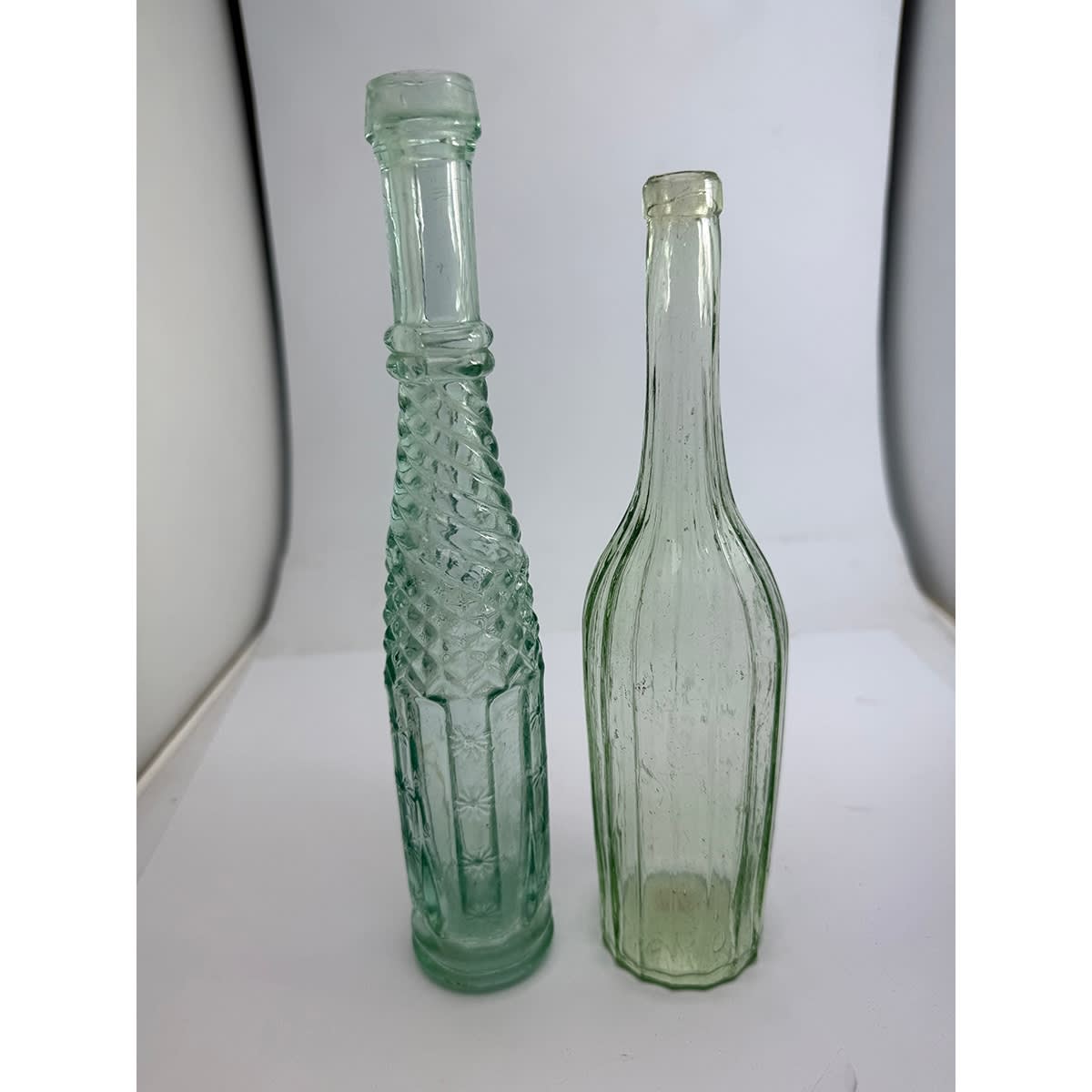 2 Salad Oils. Half Whirly with Daisy pattern to lower panels; Fluted with "Registration Diamond" to base.