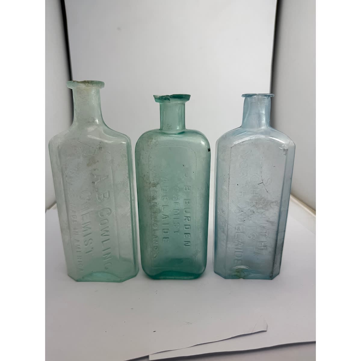 3 Chemists: A. B. Cowling (North Adelaide) 8oz, 178 mm; J. B. Burden, Adelaide 8 oz 167 mm; S. Smith, North Adelaide 8 oz 167 mm. (South Australia)