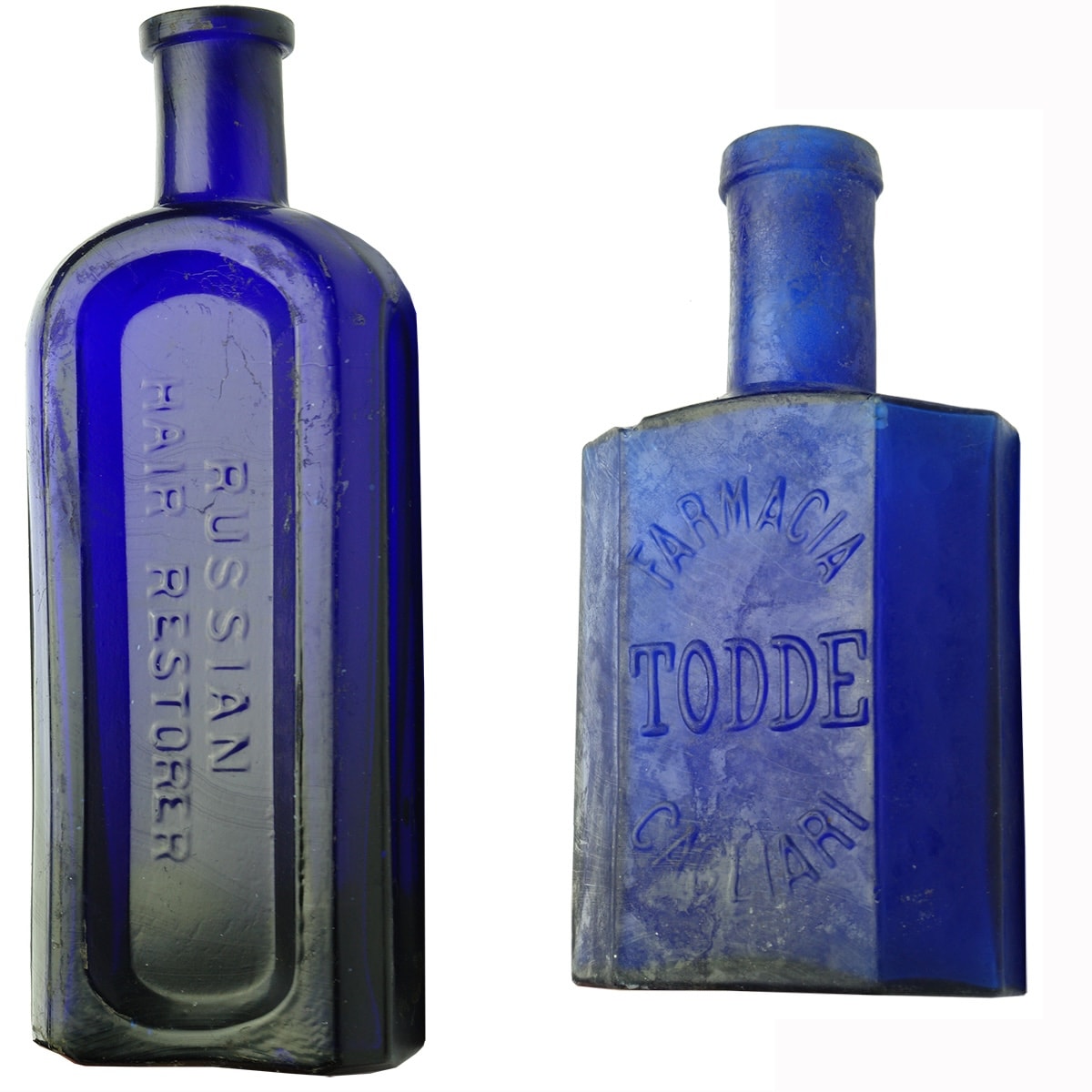 2 Blue Bottles: Russian Hair Restorer (Hatton & Laws, Launceston, Tasmania); Famacia, Todde, Cagliari. 6 oz.