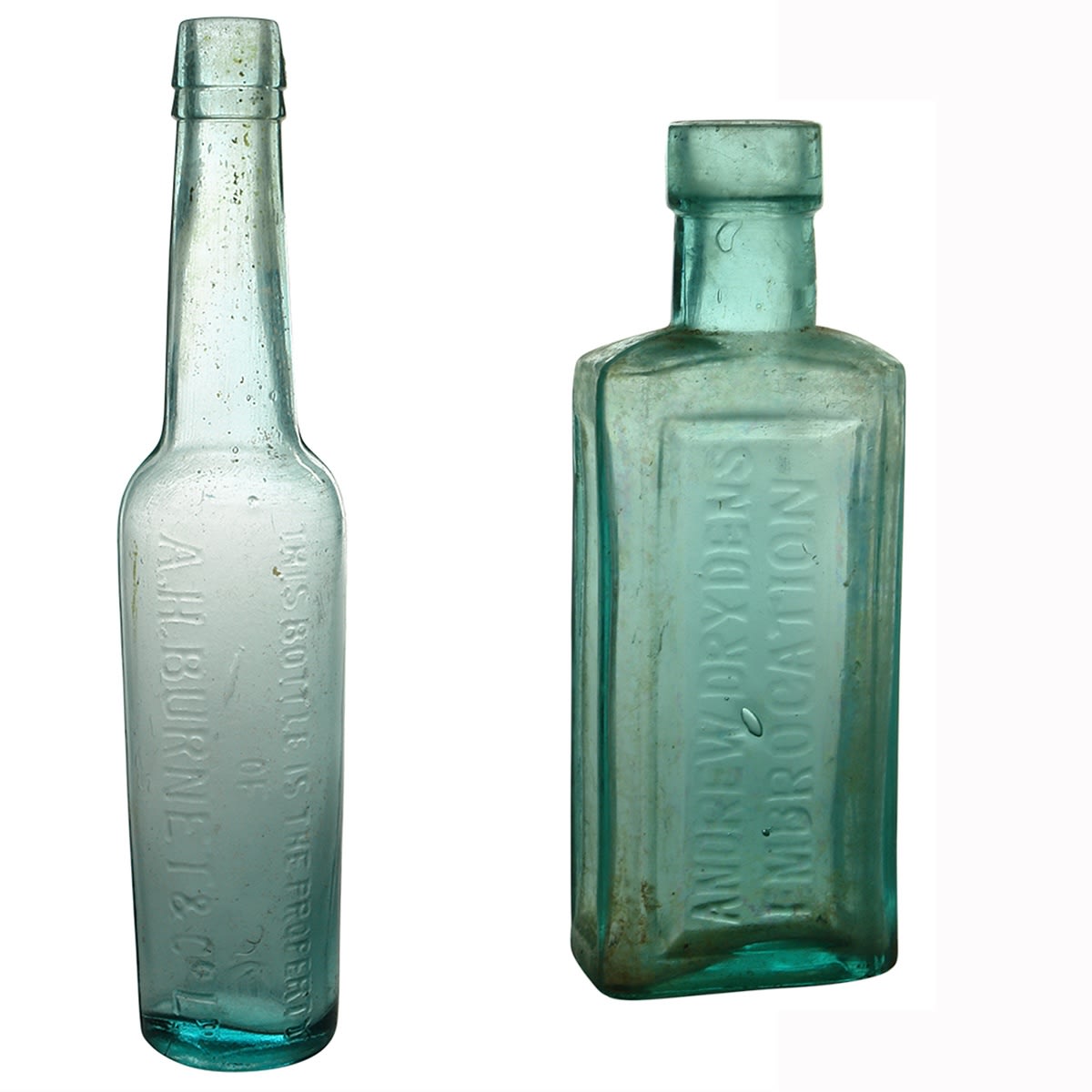 2 Bottles: Castor Oil. A. H. Burnet & Co Ld. Aqua. 5 oz. (New South Wales) Cure. Andrew Dryden's Embrocation. Aqua. 4 oz. (Queensland)