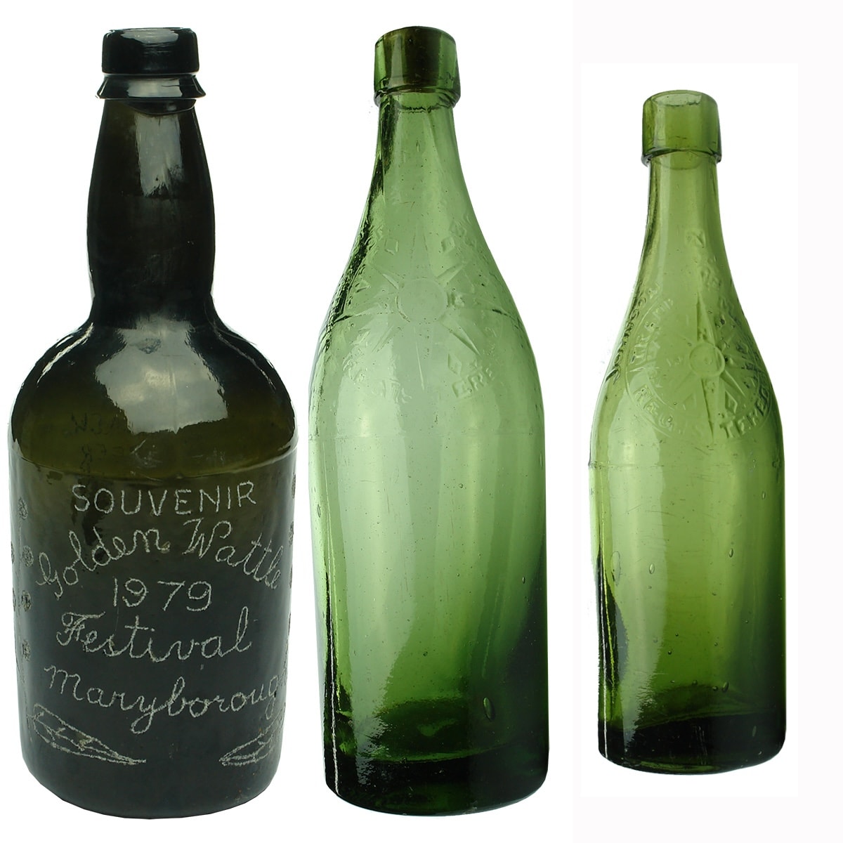 3 Bottles: Black Glass. Engraved Golden Wattle Festival Maryborough 1979. Base embossed: W & J C; 2 Beers. Large & Small Johnson Liverpool Cork top beers.