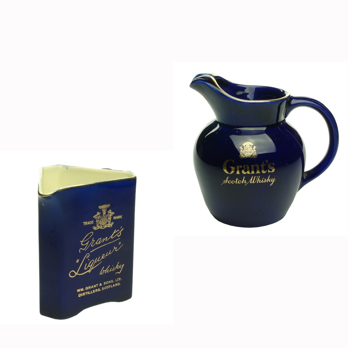 2 Whisky Water Jugs: Earlier Grant's Liqueur Whisky, triangular; More modern Grant's Scotch Whisky, round.