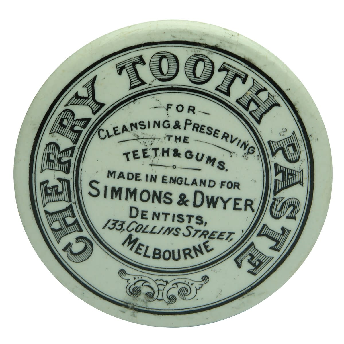 Pot Lid. Simmons & Dwyer, Dentists, 133 Collins Street, Melbourne. Cherry Tooth Paste. Black & White. (Victoria)