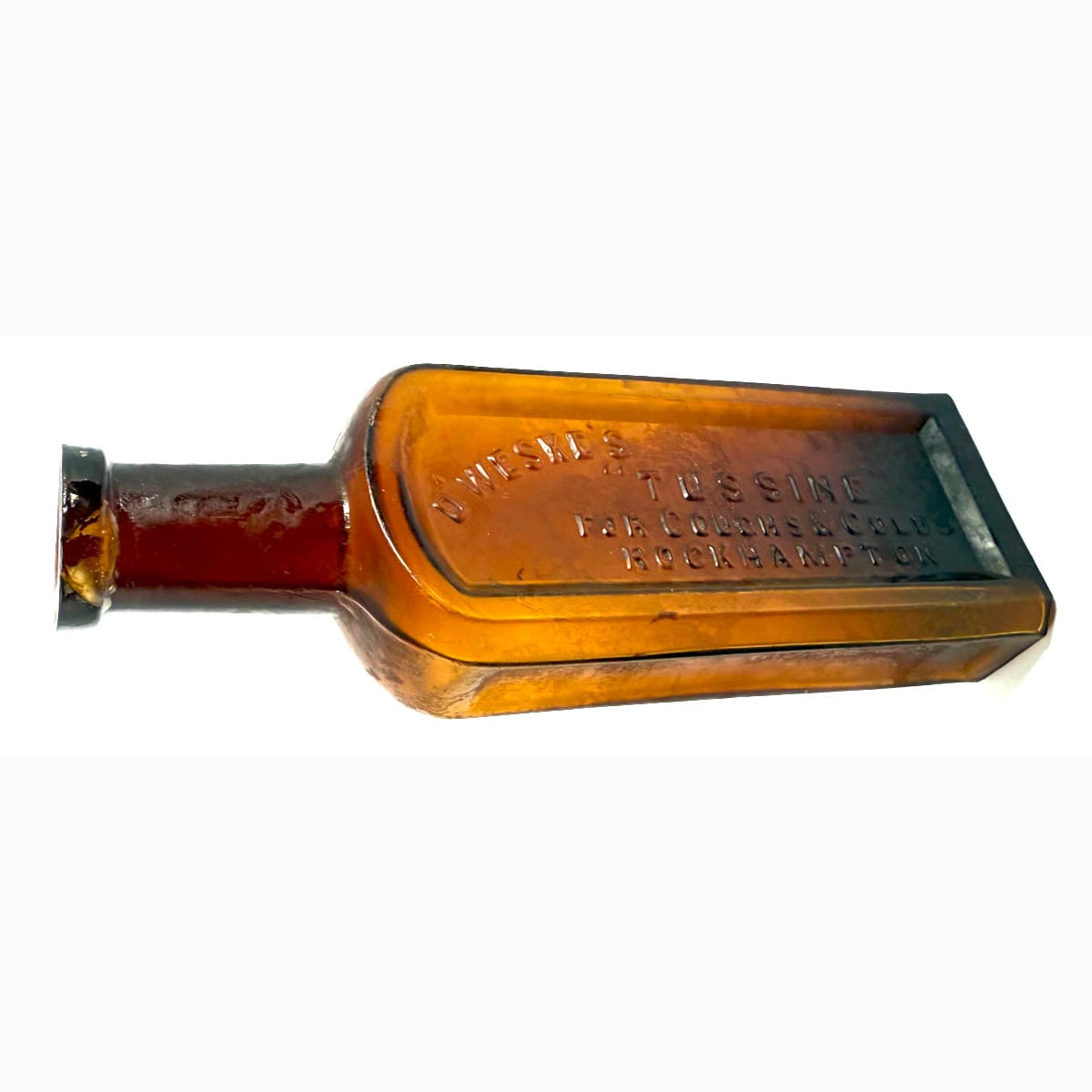 Cure. D'Weske's Tussine for Coughs & Colds, Rockhampton. Amber. 2 oz. 128 mm. (Queensland)