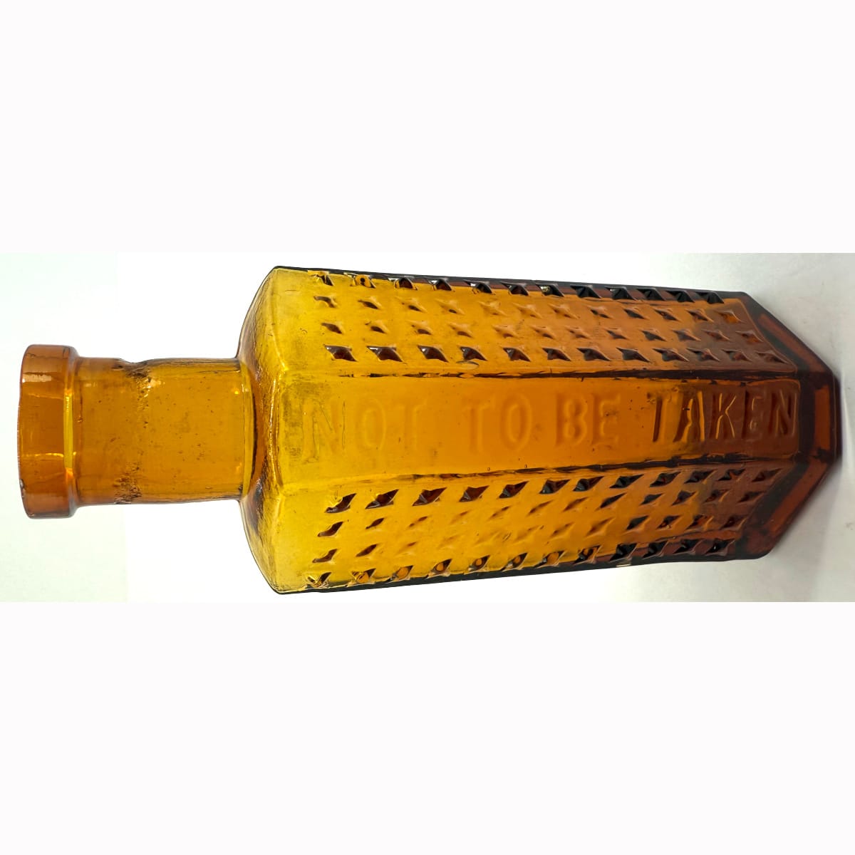 Poison. Irregular Hexagon / Coffin like shape. Bright Orange Amber. Made in Japan. Not To Be Taken. 2 oz. 106 mm.