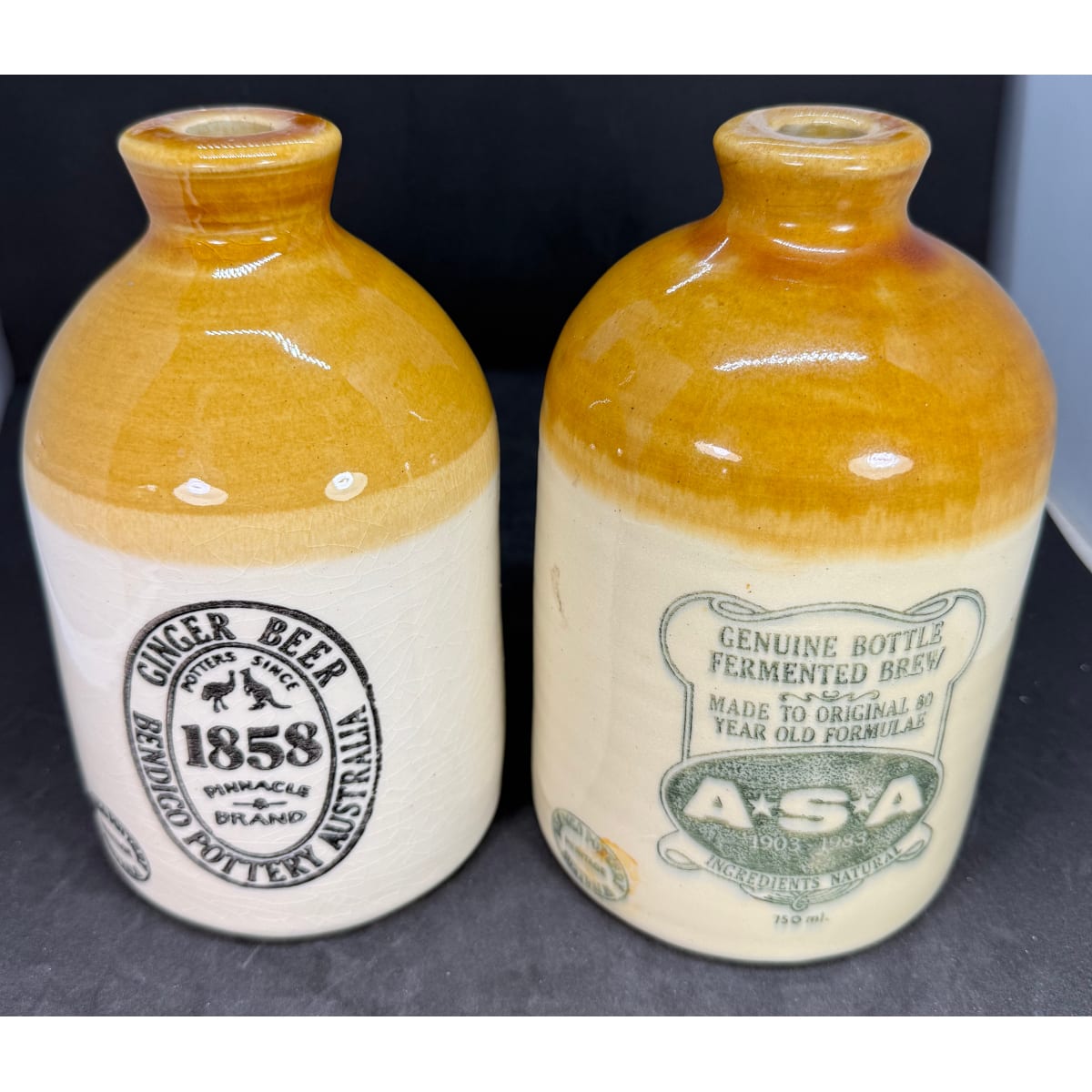 2 Small Bendigo Pottery Demijohns. Bendigo Pottery Heritage 1858 & ASA 1903 - 1983 Genuine Bottle Fermented Ginger Beer. 750 ml.