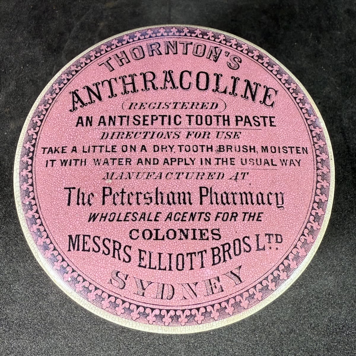 Pot Lid. Thornton's Anthracoline, The Petersham Pharmacy, Elliott Bros Ltd, Sydney. Pink background. With a base. (New South Wales)