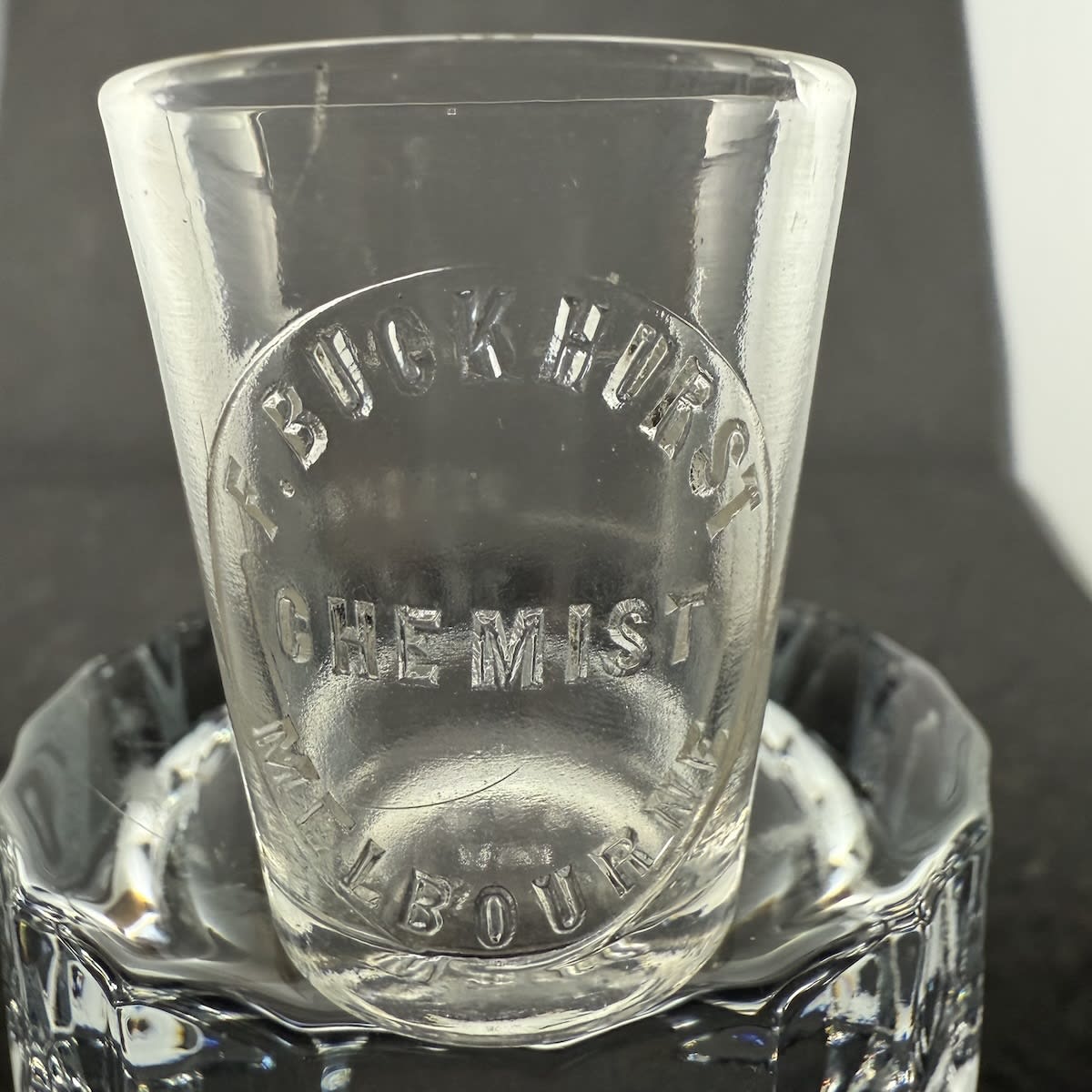 Dose Cup. F. Buckhurst, Chemist, Melbourne. Whitall Tatum. One Table Spoon size. (Victoria)