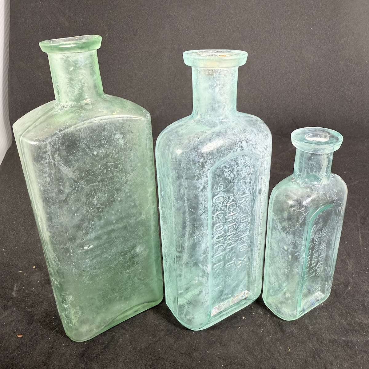 3 Chemist Bottles. R. O. Fox, Chemist, Gouger St (5 oz, 152 mm & 2 oz, 110 mm) and one with just Fox embossed on the base (6 oz, 160 mm). (Adelaide, South Australia)