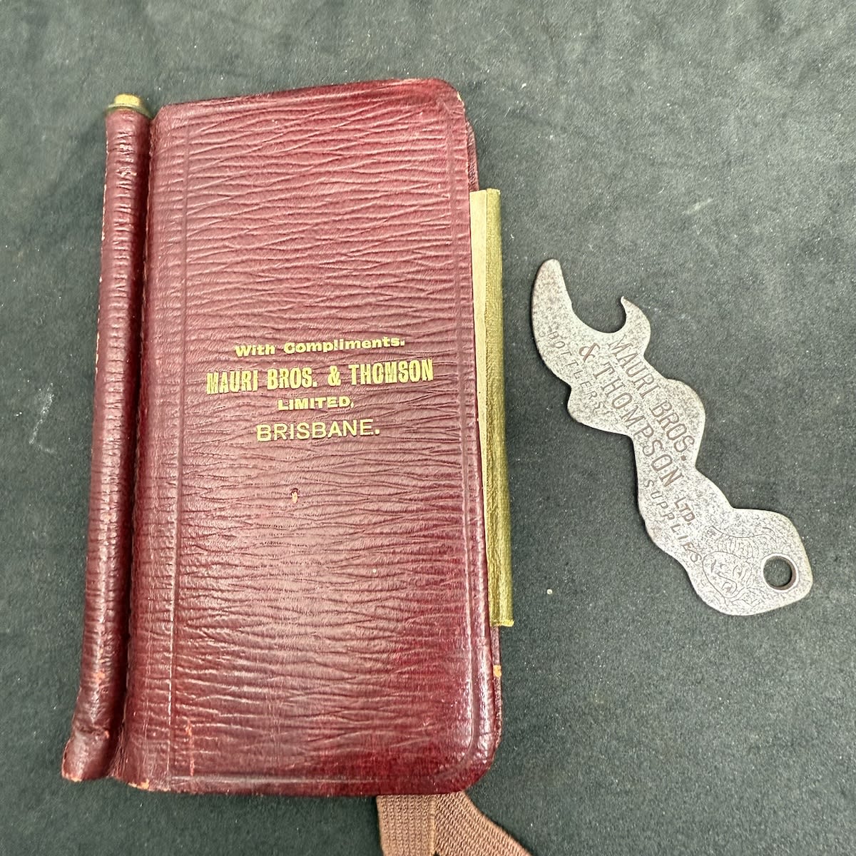 Advertising Bottle Opener & Notebook. Mauri Bros & Thomson (Thompson on the opener). Brisbane note book.