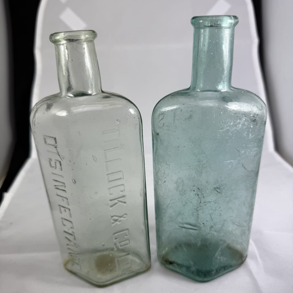 2 Phenyles/Disinfectants. Tillock & Co Ltd Burnet's, A. H. Burnet & Co Ltd. 10 oz. (New South Wales)