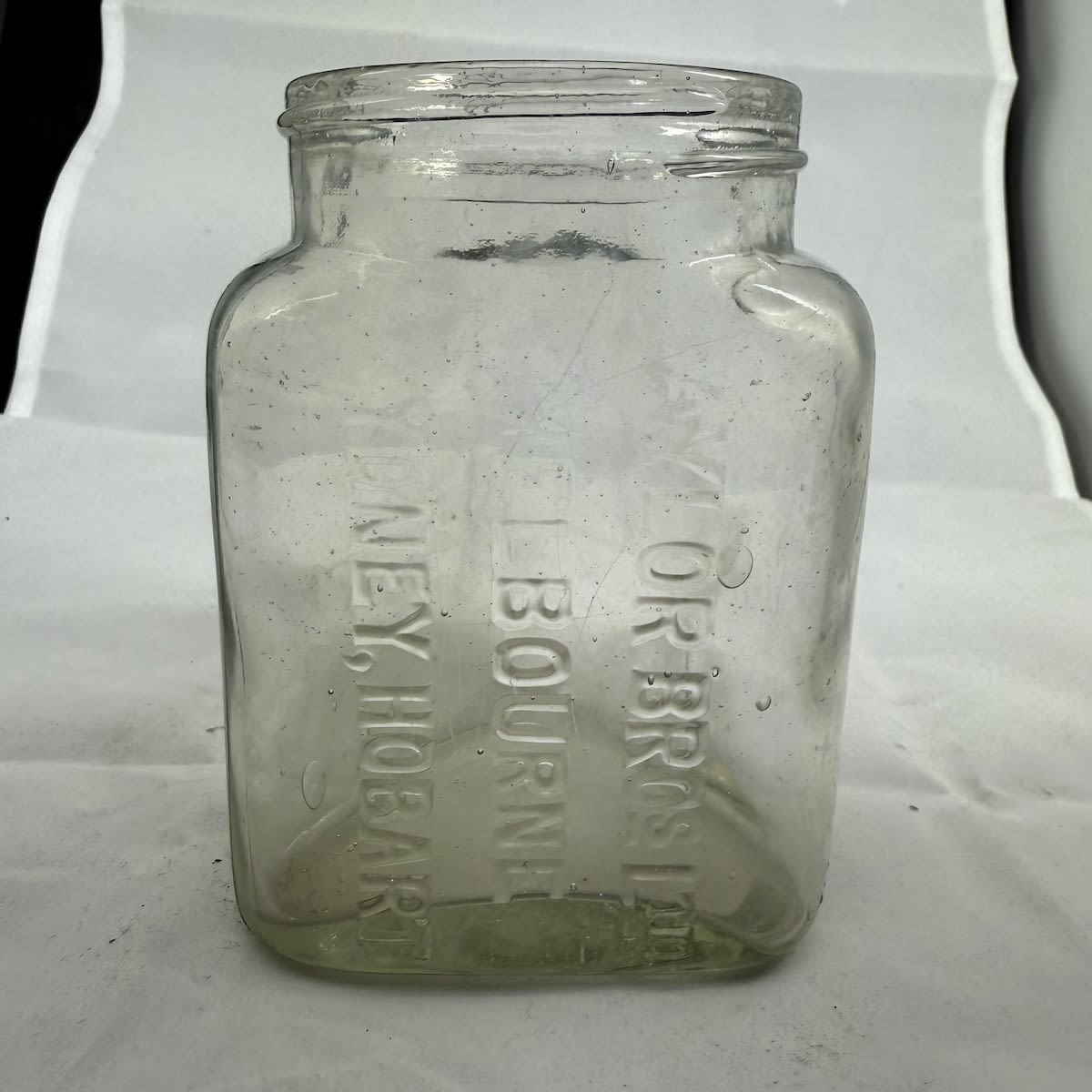 Jar. Taylor Bros. Ltd. Melbourne, Sydney, Hobart. Triangular. Half Pint. Screw top.