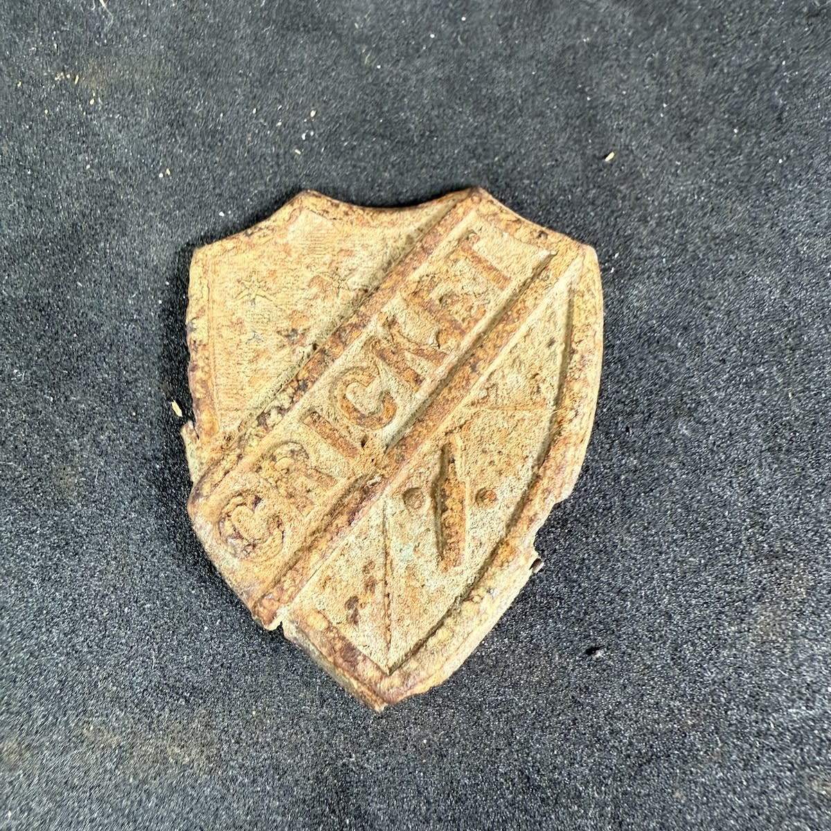 Cricket Belt Sash Buckle. Central part of a shield with Stars, Bat & Balls.