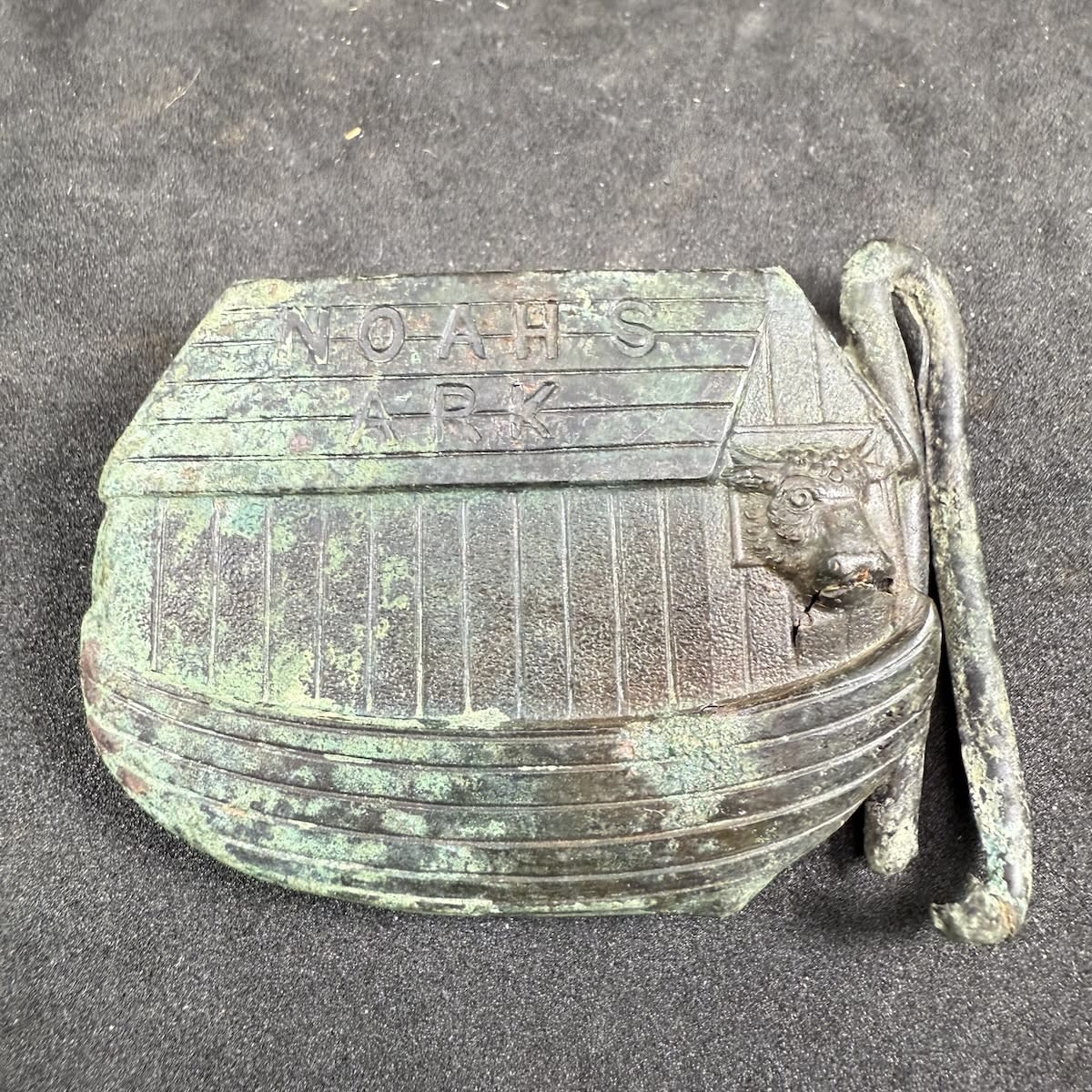 Belt Sash Buckle. Noah's Ark, figural of the ark with Cows head at one end.