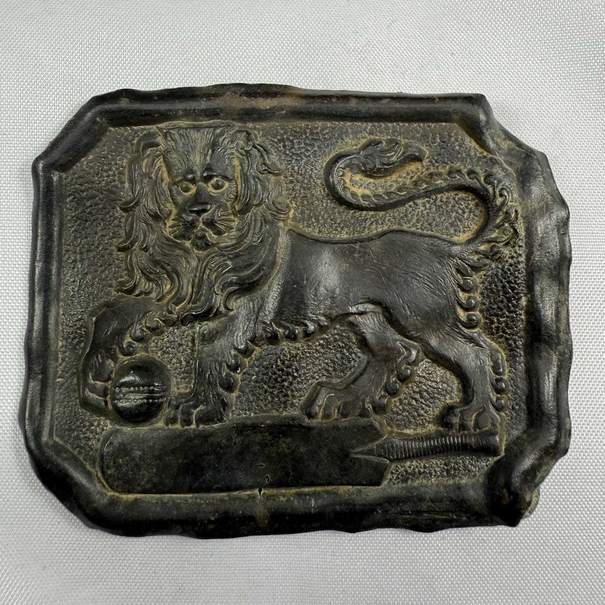 Cricket Belt Sash Buckle. Lion with Ball standing on a Cricket bat.