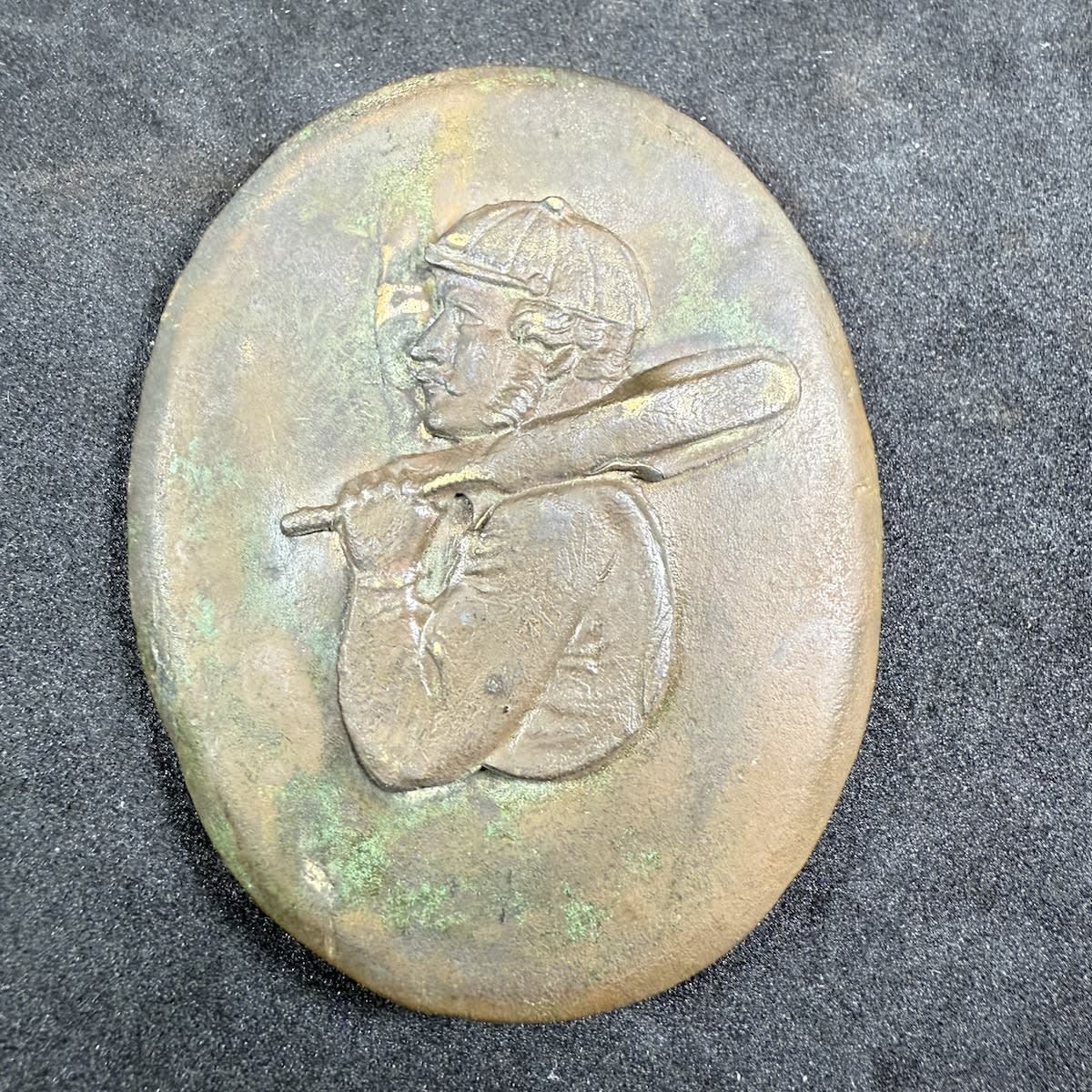 Cricket Belt Sash Buckle. Heavier oval brass with attached decoration of Cricketer in Cap with bat over his shoulder.