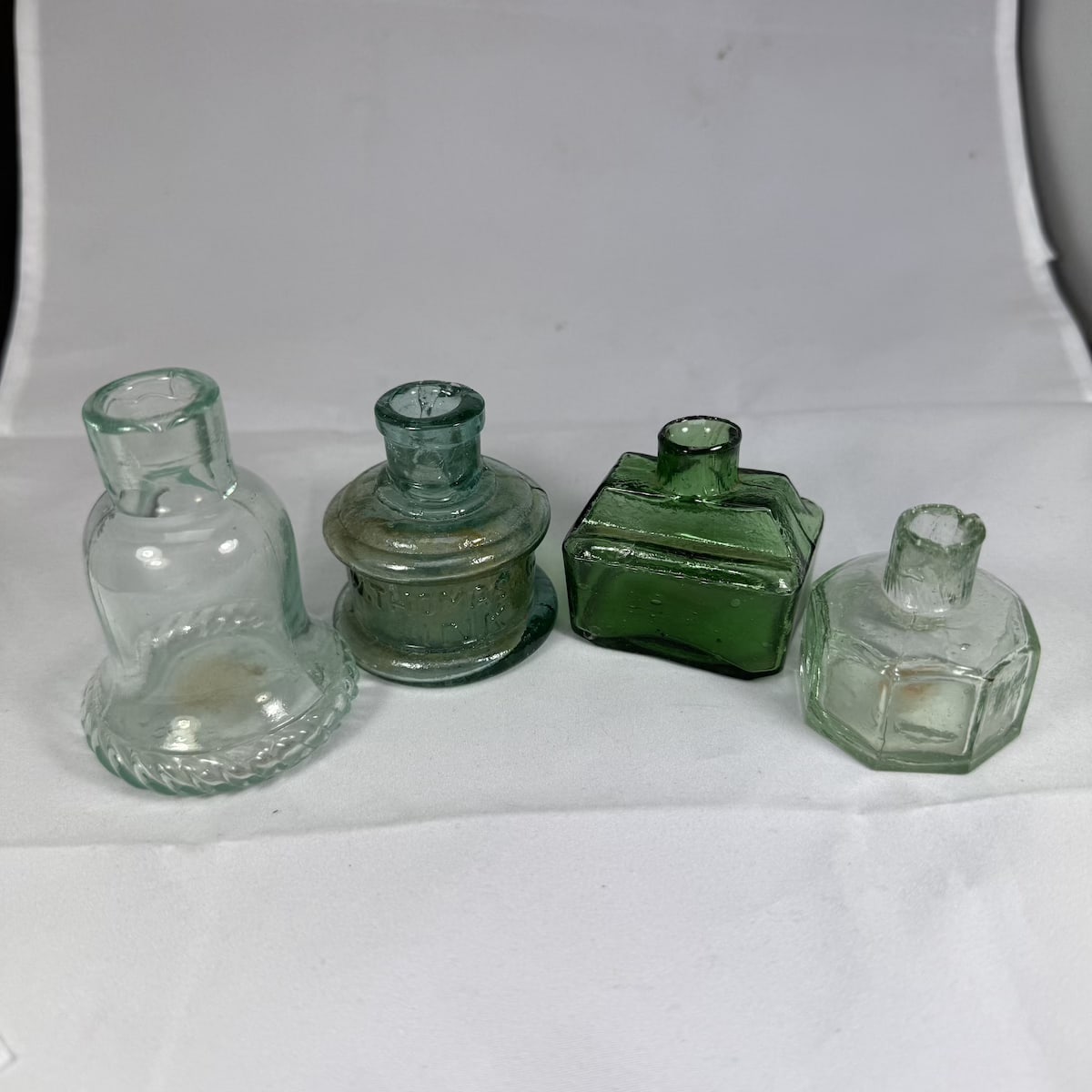 4 Glass Inks: Bell shape with Herringbone pattern around base edge W. Thomas & Co, Made in Japan Light Green Boat Ink Small sized Octagonal.