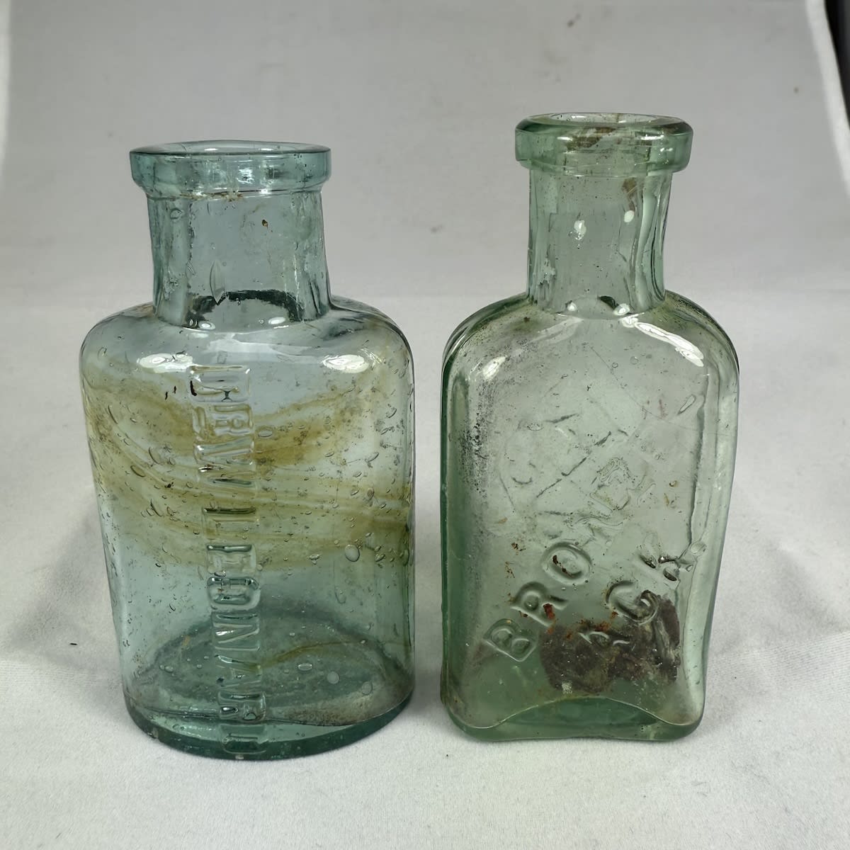 2 Small Bottles: Dr W. Leonard Bronze-Lack.