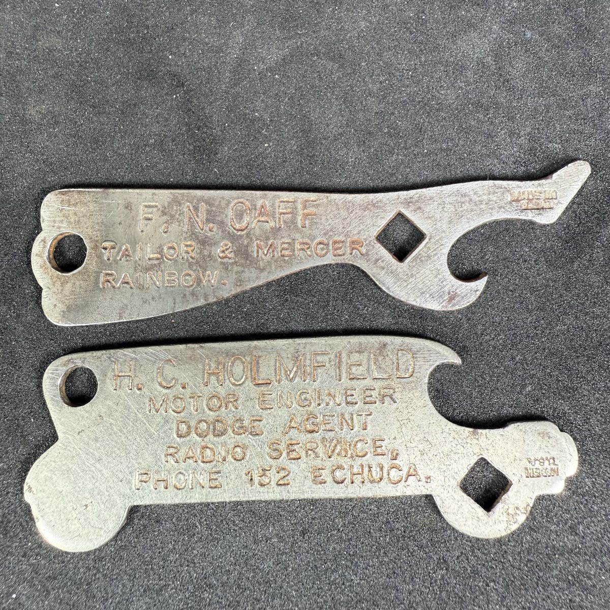 2 Advertising Crown Seal Openers: F. N. Caff, Tailor & Mercer, Rainbow H. C. Holmfield, Motor Engineer, Dodge Agent, Radio Service, Echuca. (Victoria)
