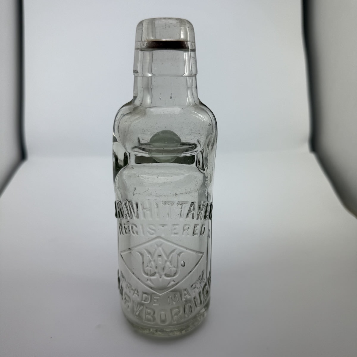 Codd. M. A. Whittaker, Maryborough. MAW Monogram. Clear. 6 oz. "Modern" base mark. 1930s. (Victoria)