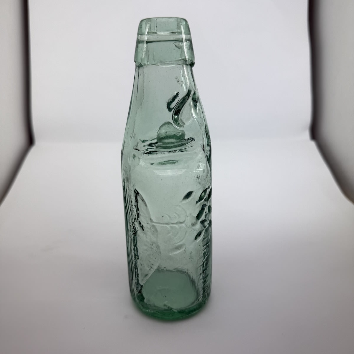 Codd.  Charles Oertel's, 403 Pitt Street,  Sydney. Whale spouting Torpedo bottles. One way pour. 6 oz. (New South Wales)