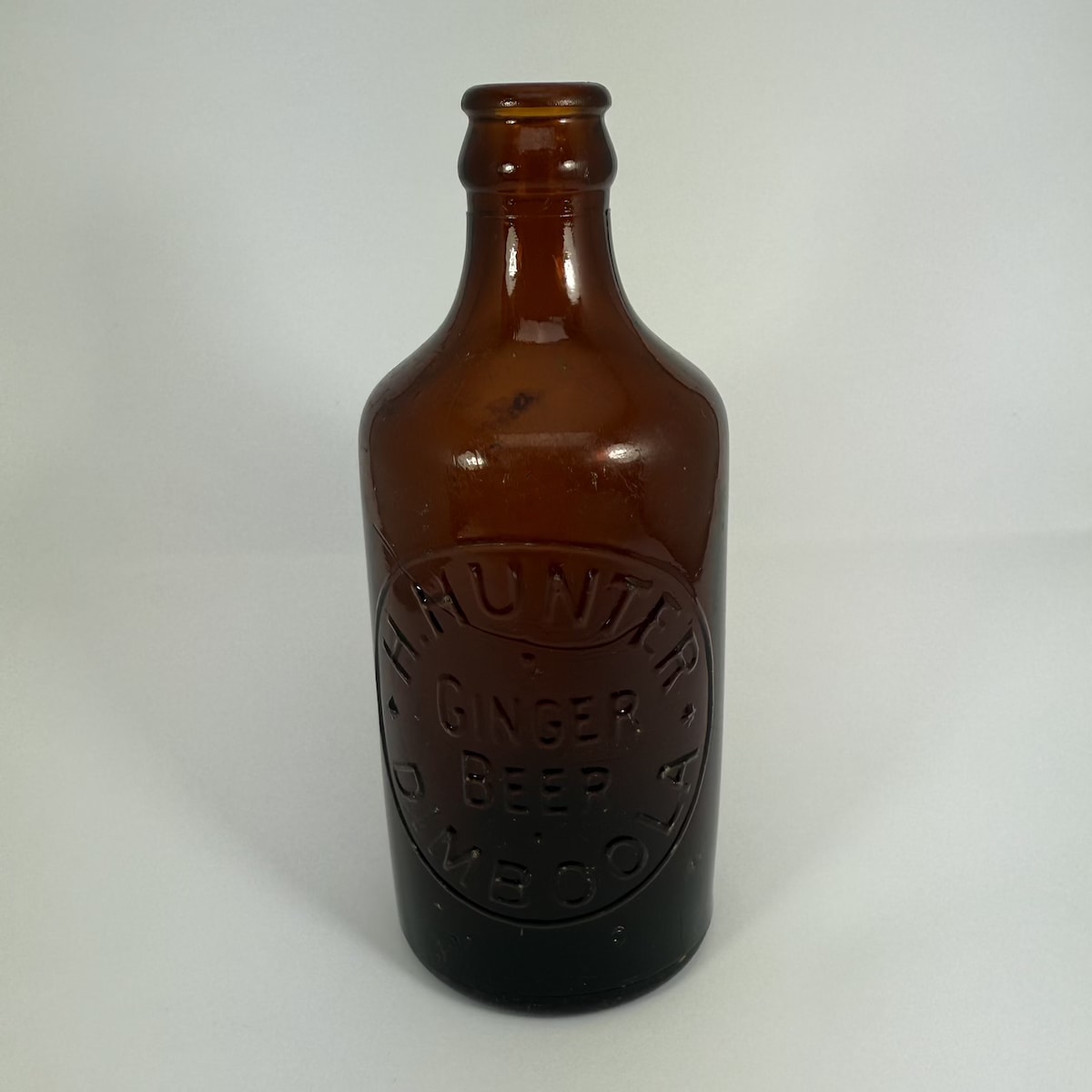 Crown Seal Glass Ginger Beer. H. Hunter, Dimboola. Amber. Dump. Variety without back embossing. (Victoria)
