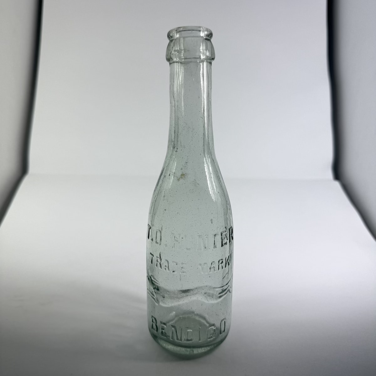 Crown Seal. T. O. Hunter, Bendigo. Greyhound. Bluish Aqua. 6 oz. (Victoria)