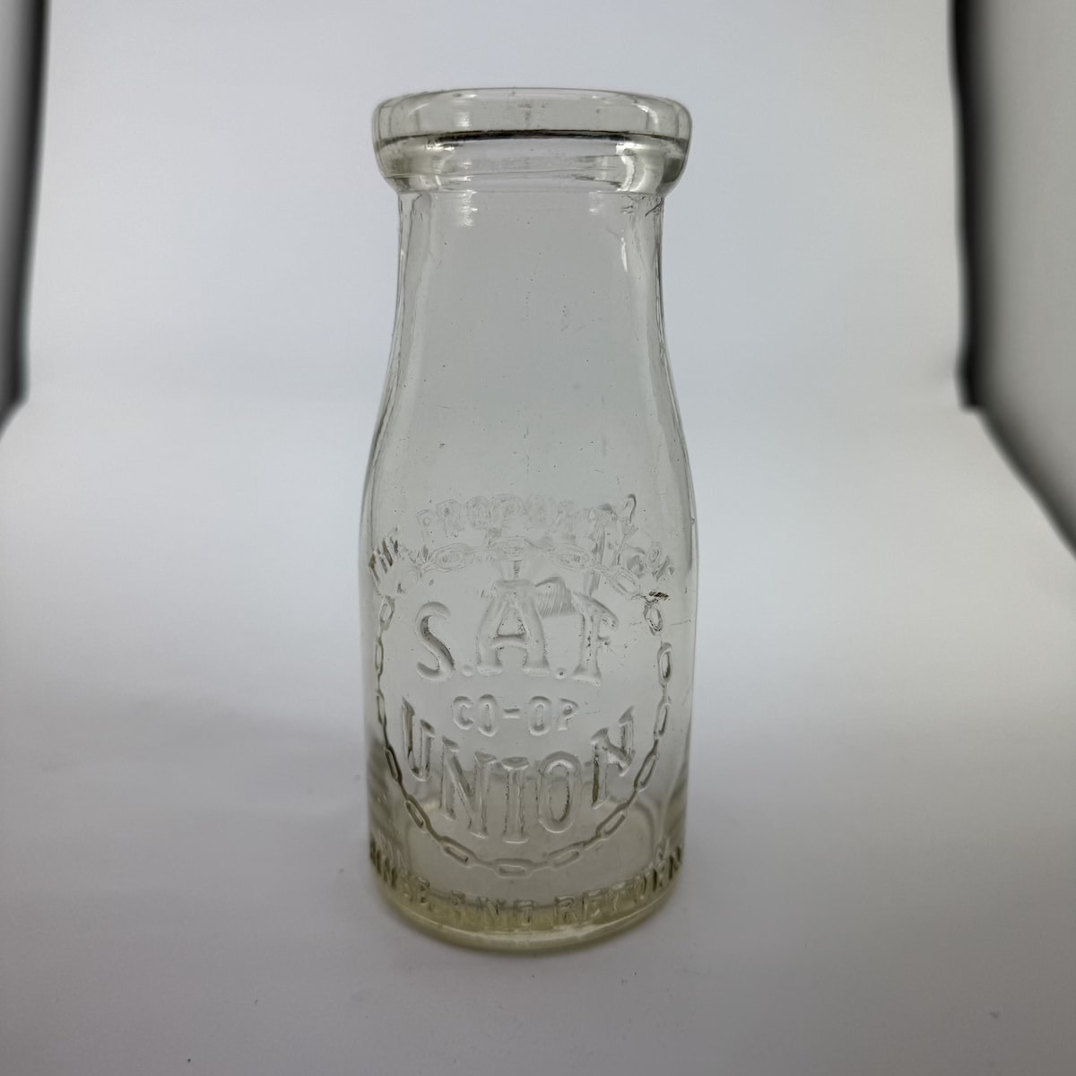 Milk. S. A. F. Co-op Union. Chain link embossing. AGM. Half Pint. (South Australia)