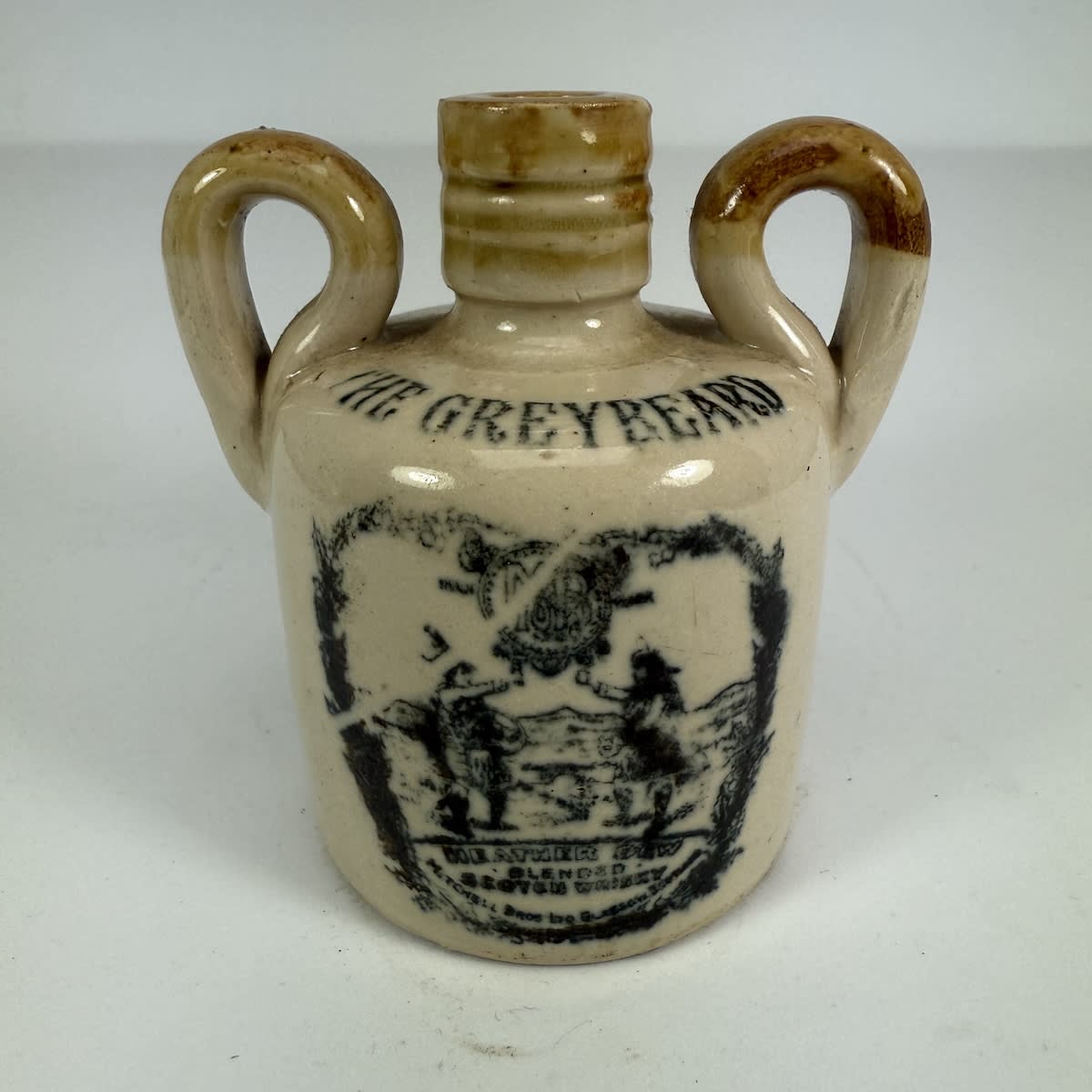 Sample Whisky Jug. The Greybeard. Mitchell Bros Ltd. Heather Dew. Scotsmen toasting. Glasgow.