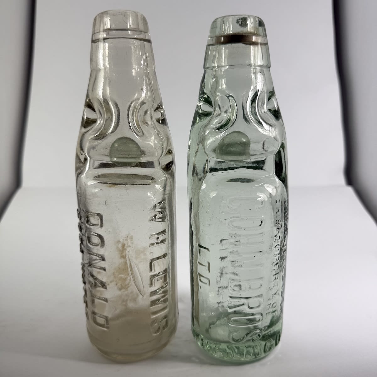2 Small Codd Bottles: W. H. Lewis, Donald; Cohn Bros Ltd, Bendigo. Soda Water. 6 oz. (Victoria)