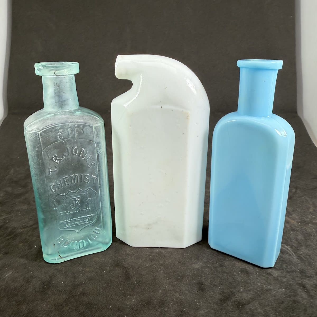 3 Little Bottles: T. R. Jones, Bendigo 2 oz Chemist; Odol Mouth wash; Blue milk glass plain.