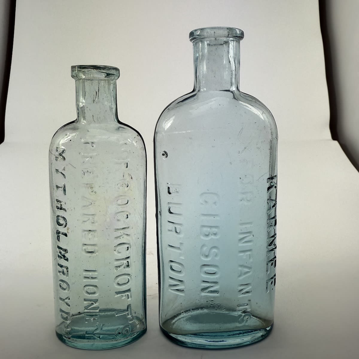 2 Cure Bottles. Karmee for Infants, Gibson, Burton; R. Cockcroft's Prepared Honey Mytholmroyd. (UK)